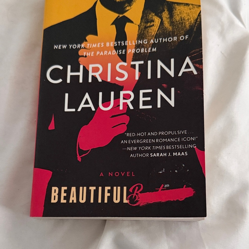 Christina Lauren Novel with Striking Red and Black Design